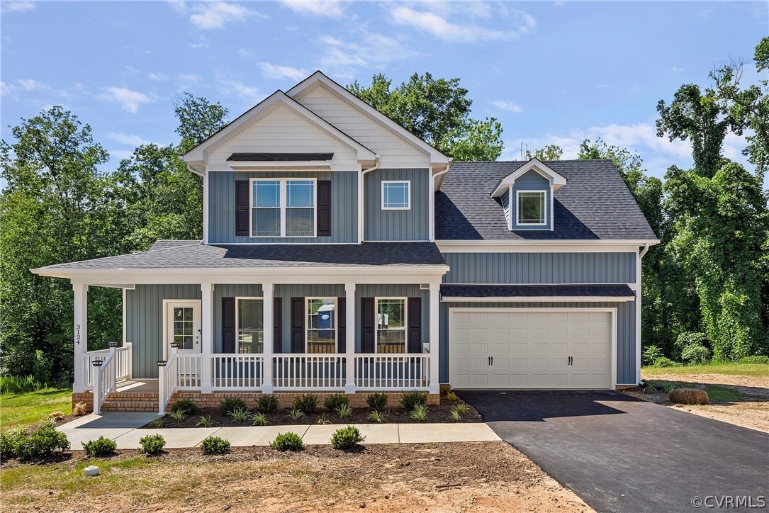 Completed custom home with a welcoming front porch